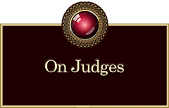 Ornate red centered button linked to: pdf document labelled 'On Judges’, exploring the statutory contract relative to England and its dominions established primarily for the continuance of stable governance by succeeding sovereigns.